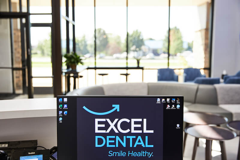 excel dental front desk